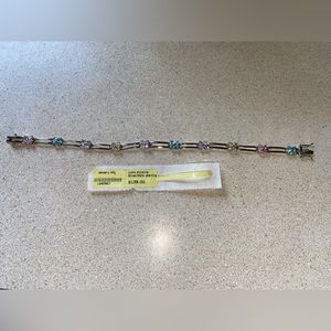 Sterling silver tennis bracelet with cubic zirconia gems